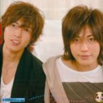 Two young men smiling at camera