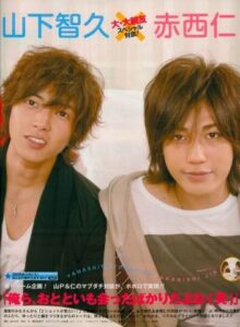 Two young men smiling at camera