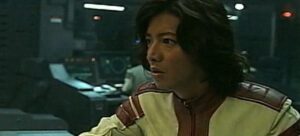 Person in sci-fi spaceship control room