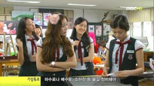 Students in school uniforms in classroom