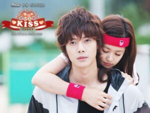 Young woman hugging young man from behind
