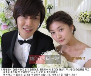 Smiling bride and groom portrait with bouquet
