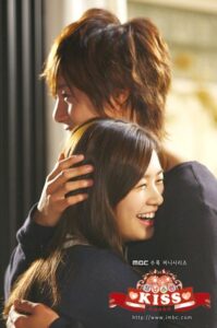 Smiling couple hugging in warm embrace