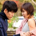 Man and woman confront each other outdoors