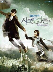 Two people floating hand-in-hand above castle