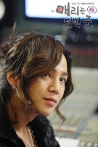 Close up portrait of person with wavy hair