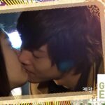 Two people kissing in ornate collage frame