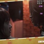 Close-up of two women facing each other