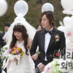 Bride and groom walking outdoors at wedding