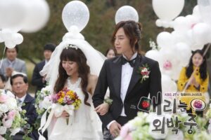 Bride and groom walking outdoors at wedding