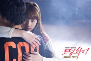 Dream High poster: woman hugging man