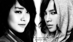 Black-and-white close-up portrait of two people