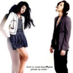 Two stylish women in jackets on white background