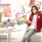 Person in red jacket reading book