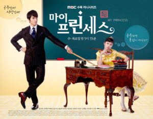 Man in suit tugging woman at ornate desk
