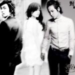 Three people in dramatic black-and-white pose