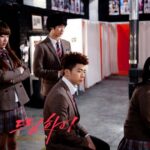 Four students in school uniforms in dressing room
