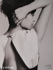 Black-and-white profile of person with raised arm