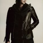 Young man in black leather jacket
