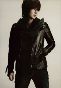 Young man in black leather jacket