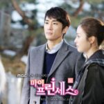 Two people conversing outdoors in TV drama