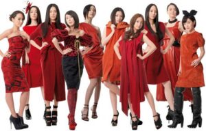 Group of models in red dresses