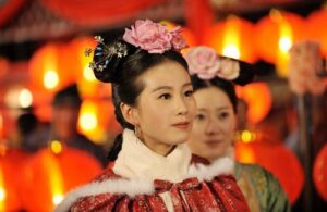 Women in traditional Chinese dress with lanterns