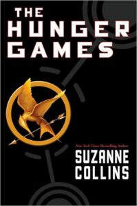 The Hunger Games cover with mockingjay emblem