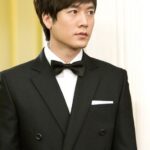 Man in black tuxedo with bow tie