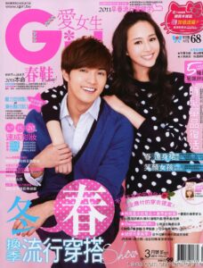 Smiling young man and woman on pink magazine