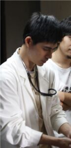Doctor wearing white coat with stethoscope