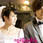 Bride and groom in wedding attire indoors