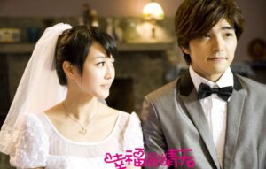 Bride and groom in wedding attire indoors