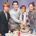 Four young adults cutting birthday cakes