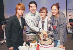 Four young adults cutting birthday cakes