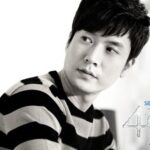 Monochrome portrait of man in striped sweater