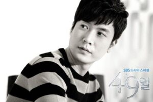 Monochrome portrait of man in striped sweater