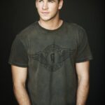Studio portrait of young man in casual t-shirt