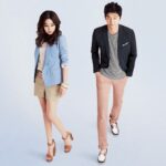 Male and female models wearing blazers and shorts