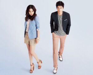 Male and female models wearing blazers and shorts