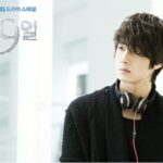 Young man with headphones looking away