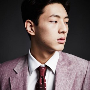 Young man in a formal suit and tie.