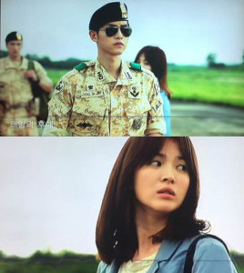 Soldier in uniform with a woman looking away.