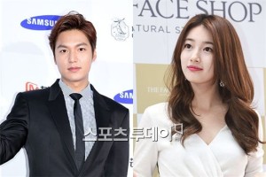 Two celebrities posing for a photo.