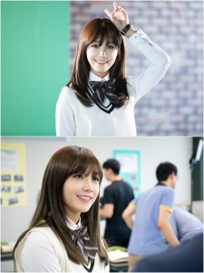 Smiling student in uniform, posing playfully.