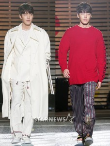 Two models walking in stylish outfits.