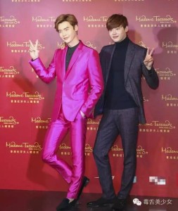 Two men posing at a promotional event.