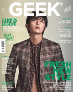 Magazine cover featuring a stylish male model.