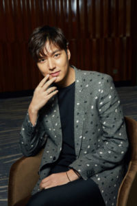 Young man in stylish polka-dotted blazer.