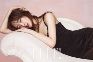 Elegant woman lounging on a chaise longue.